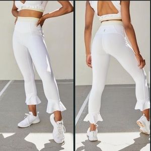 Free People white leggings with ruffled ends!